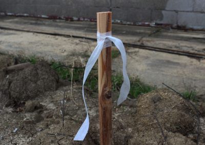 White Biodegradable Roll Flag Tied to a Stick